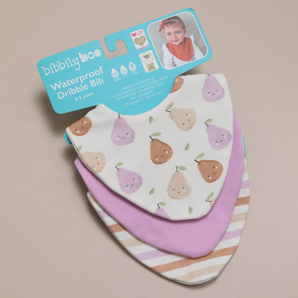 Bibbilyboo waterproof dribble bibs with pear pattern on a beige background