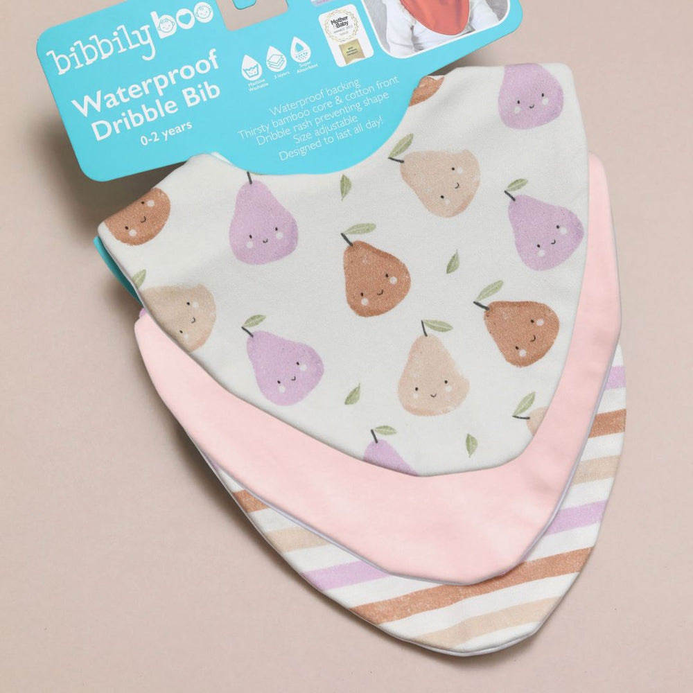 Packaged bib with pear pattern on a beige background